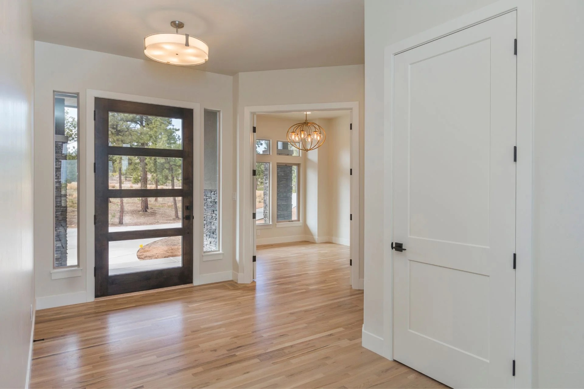 A hallway with hardwood floors.