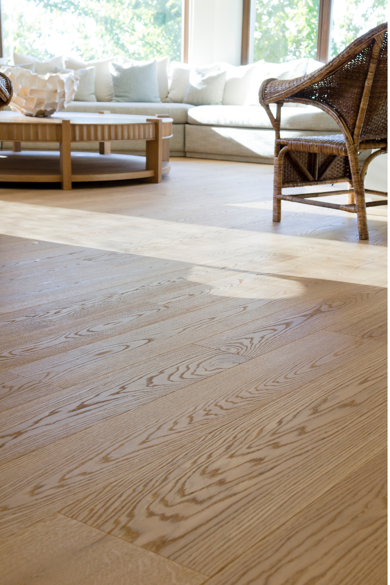 Cartersville Flooring Services 10 A living room featuring a beautiful wooden floor installed by Cartersville Flooring Company.