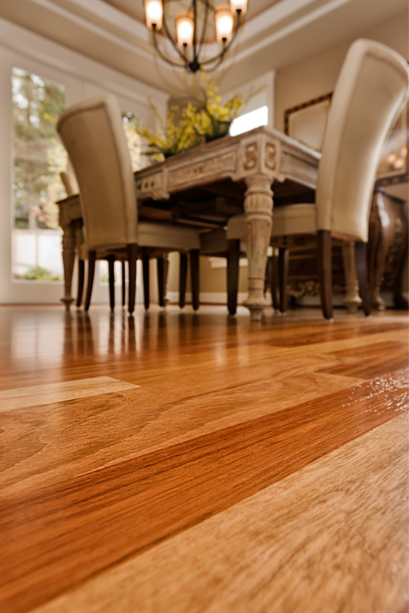 Chamblee Flooring Services 10 A room with Chamblee Flooring Company's hardwood floors and a dining table.