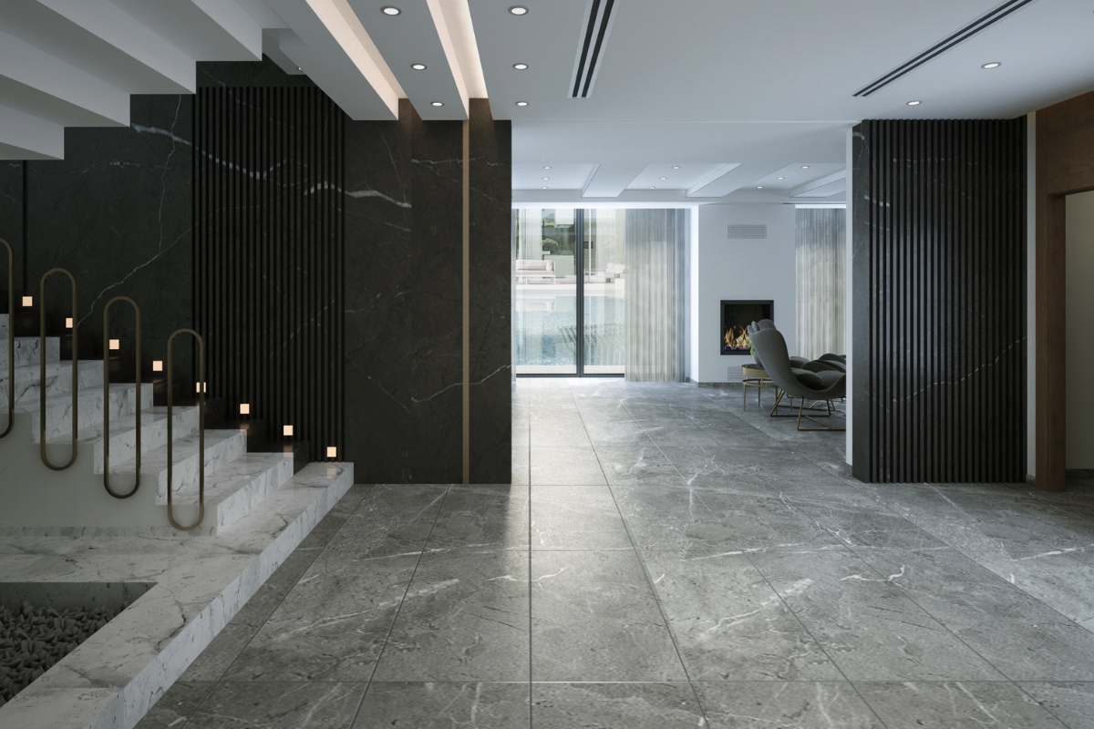 Best Flooring Options for High-Traffic Areas in Chamblee Homes 4 Modern interior space with marble floors—one of the best flooring options—features a staircase with candles, dark accent walls, and a seating area by a fireplace near large windows with sheer curtains.