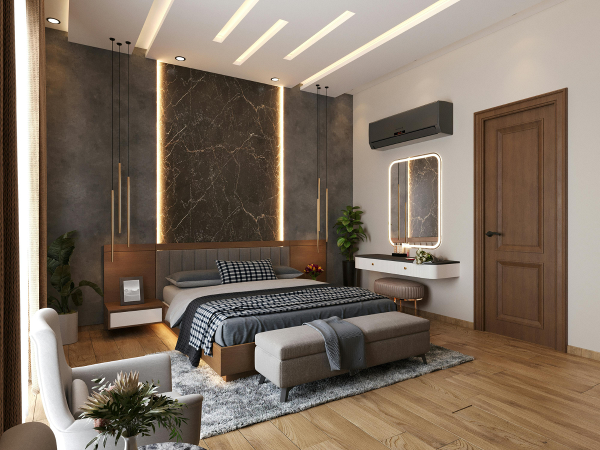 Cozy & Stylish Bedroom Flooring Ideas 4 Modern bedroom with a double bed, gray accent wall, pendant lights, wooden furniture, wall-mounted mirror, plants, air conditioner, and stylish bedroom flooring that enhances the overall contemporary look.