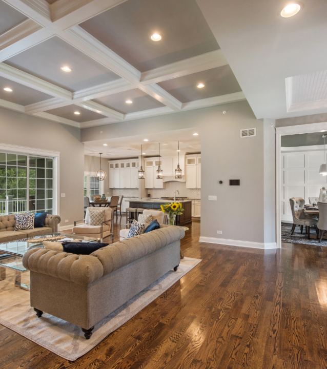 A spacious living room with stunning hardwood floors and a cozy fireplace, courtesy of Canton Flooring Company. A spacious living room with stunning hardwood floors and a cozy fireplace, courtesy of Canton Flooring Company.