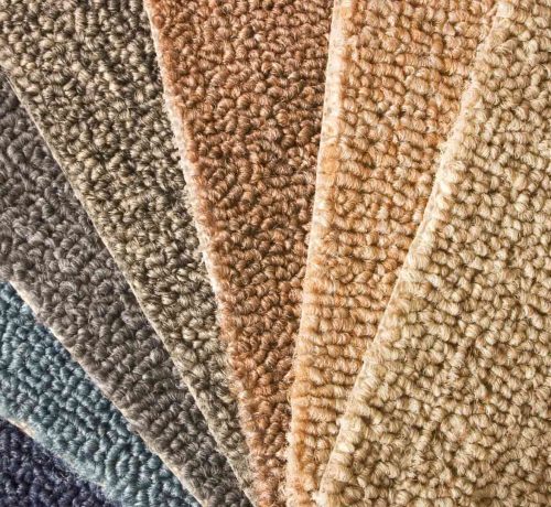 A variety of carpets in different colors for flooring needs.