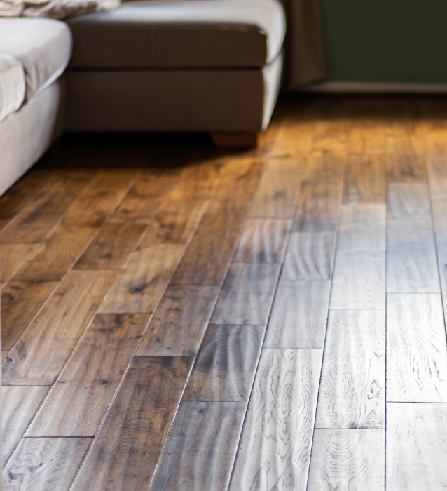 Handscraped hardwood flooring in a living room.